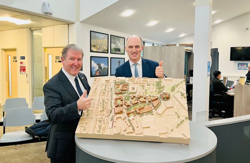  Leo and Rushmoor Borough Council Leader Cllr David Clifford looking at plans for the new Farnborough Leisure and Civic Hub